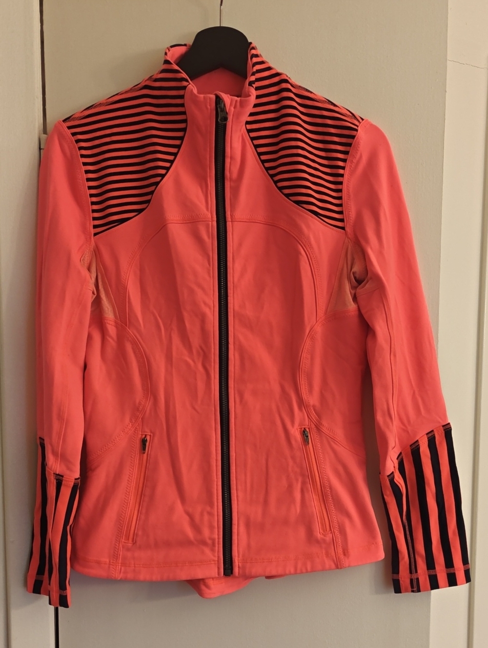 Lululemon Women’s Coral Pink Zip-Up Jacket with Black Stripe Accents